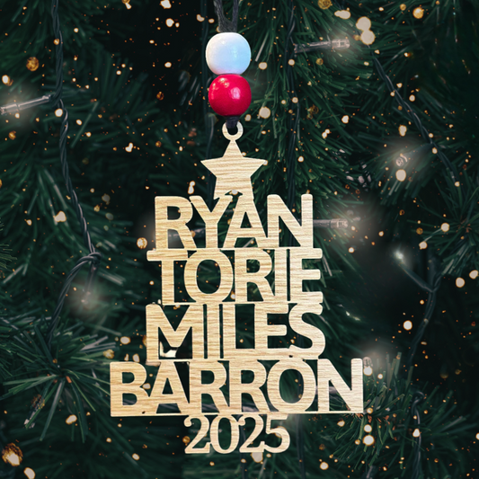 Personalized Christmas ornament featuring up to 8 family names in the shape of a Christmas Tree. The year serves as the tree trunk and the top is completed with a star.